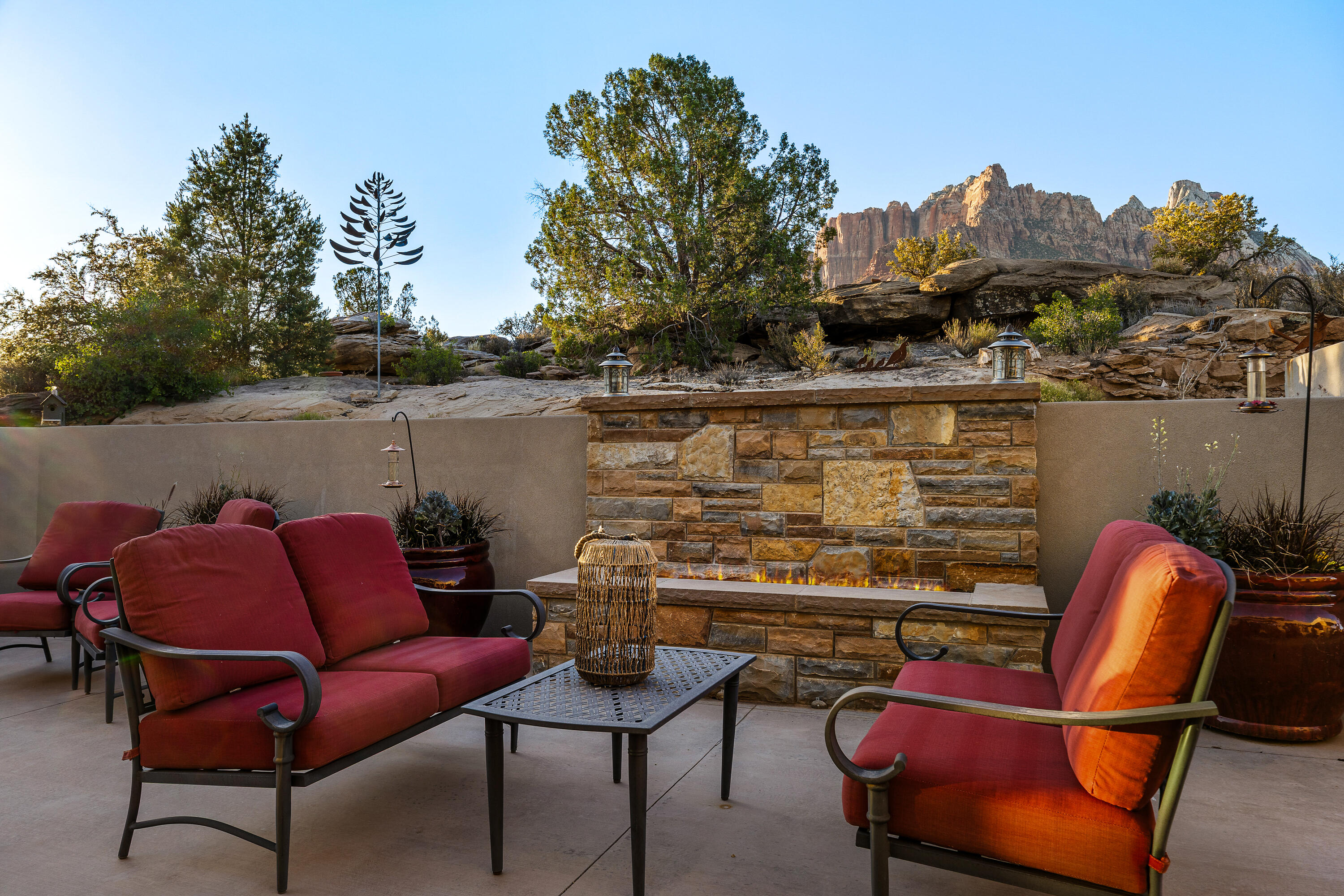 3000 Navajo Way Springdale, UT 84767 - Photo 46 of 63 Patio firepit seating area positioned toward the surrounding cliffs.