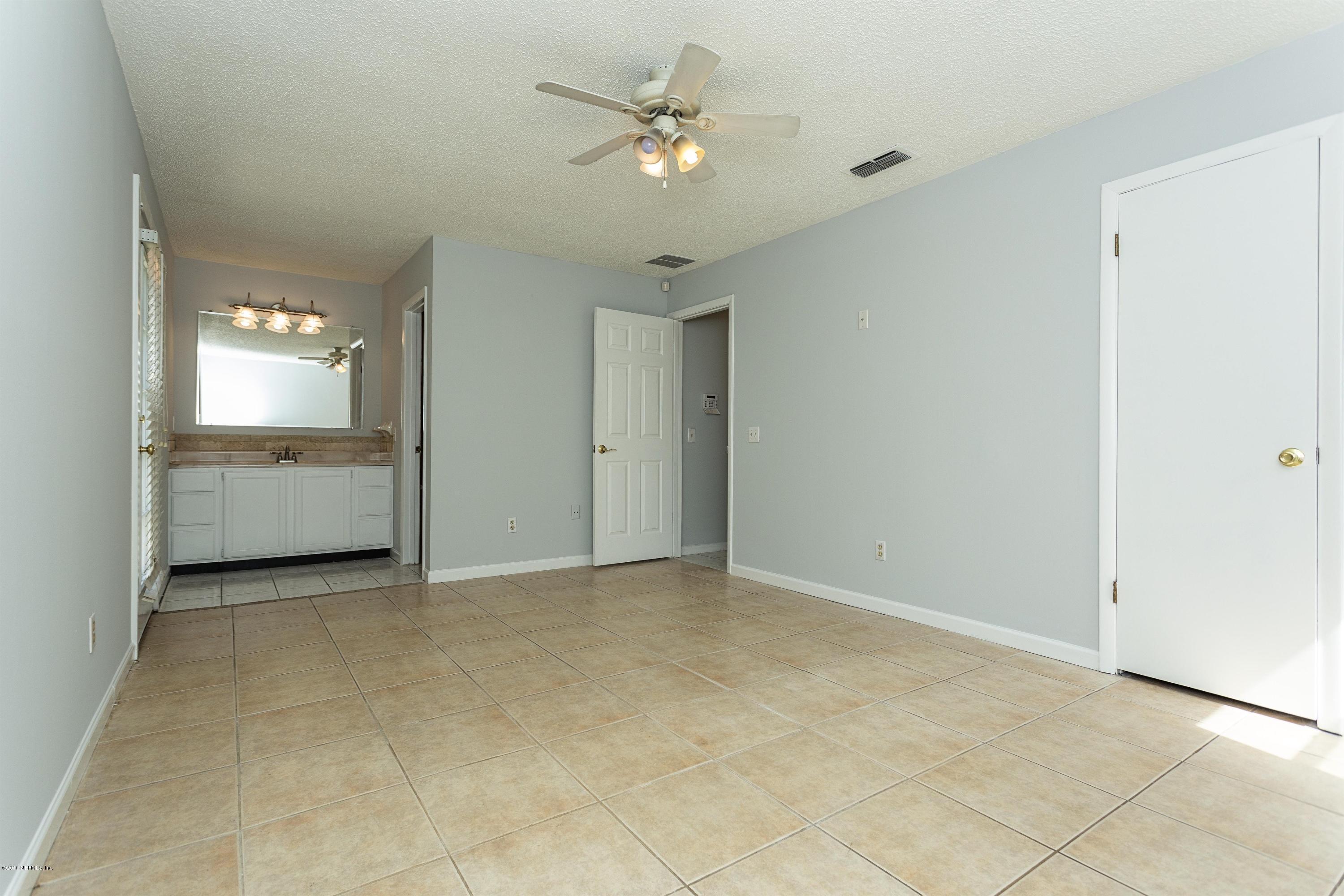 12782 Attrill Road Jacksonville, FL 32258 - Photo 14 of 25 an empty room with a bathroom