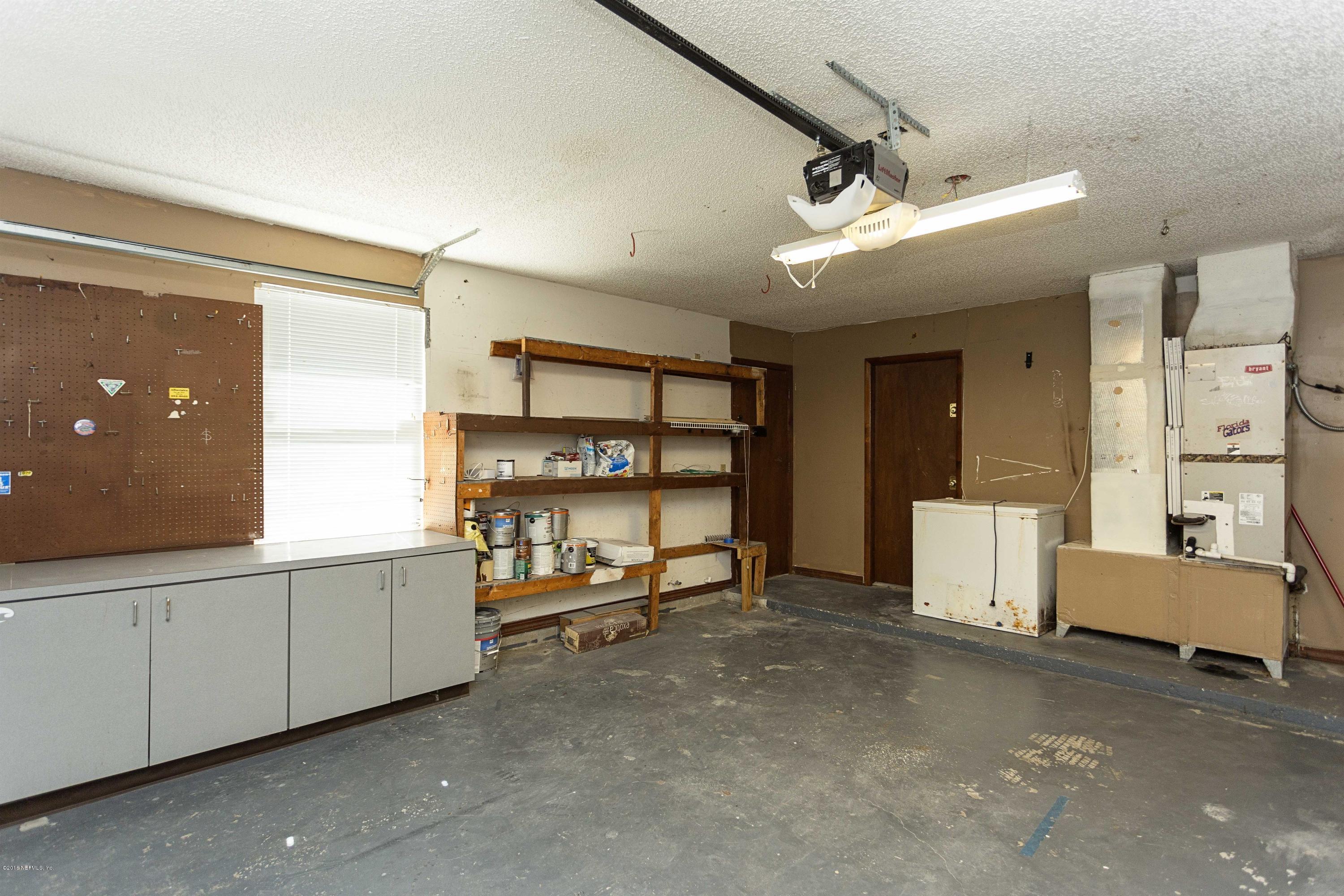 12782 Attrill Road Jacksonville, FL 32258 - Photo 21 of 25 a view of a livingroom with furniture and windows
