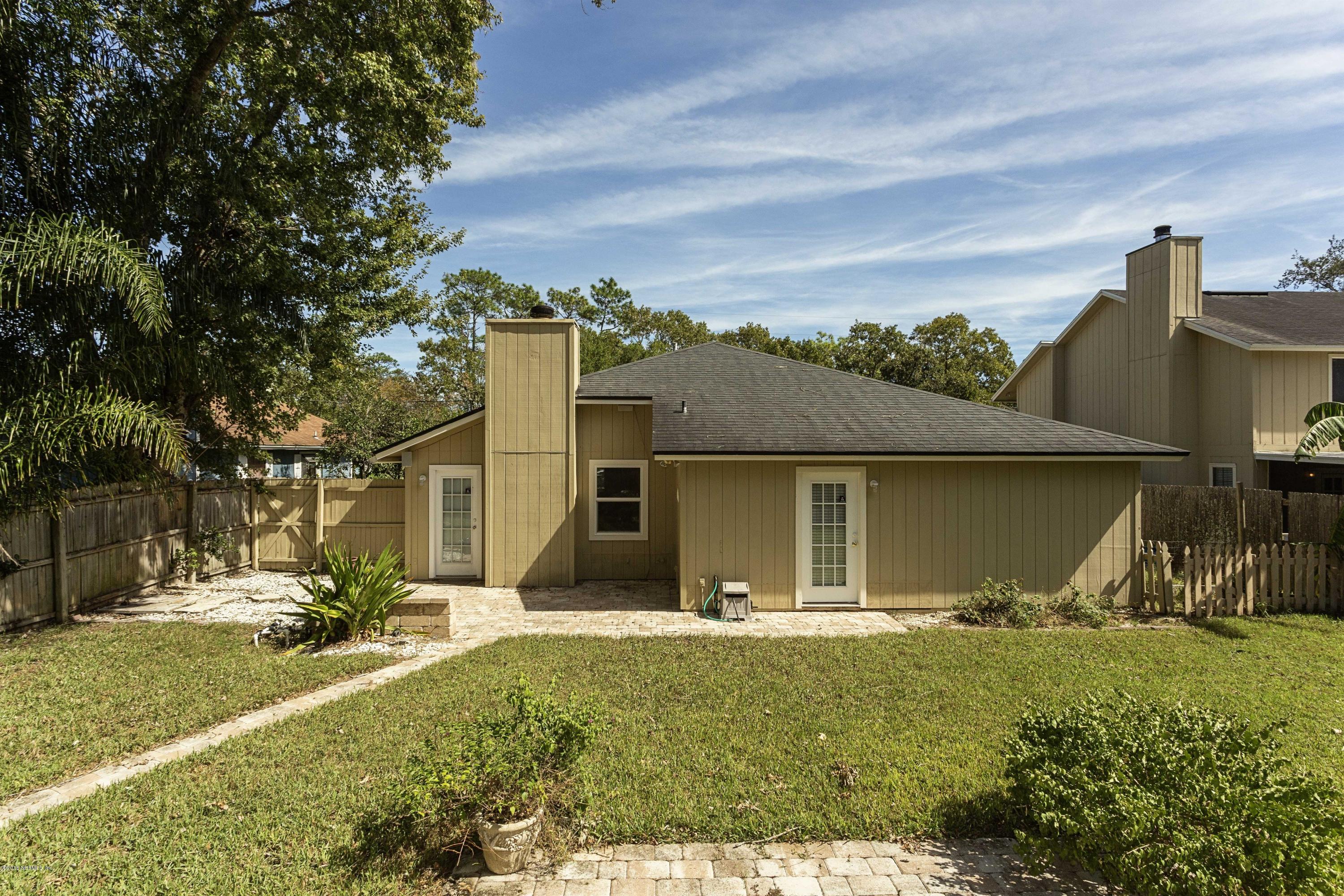 12782 Attrill Road Jacksonville, FL 32258 - Photo 22 of 25 a view of a house with a yard