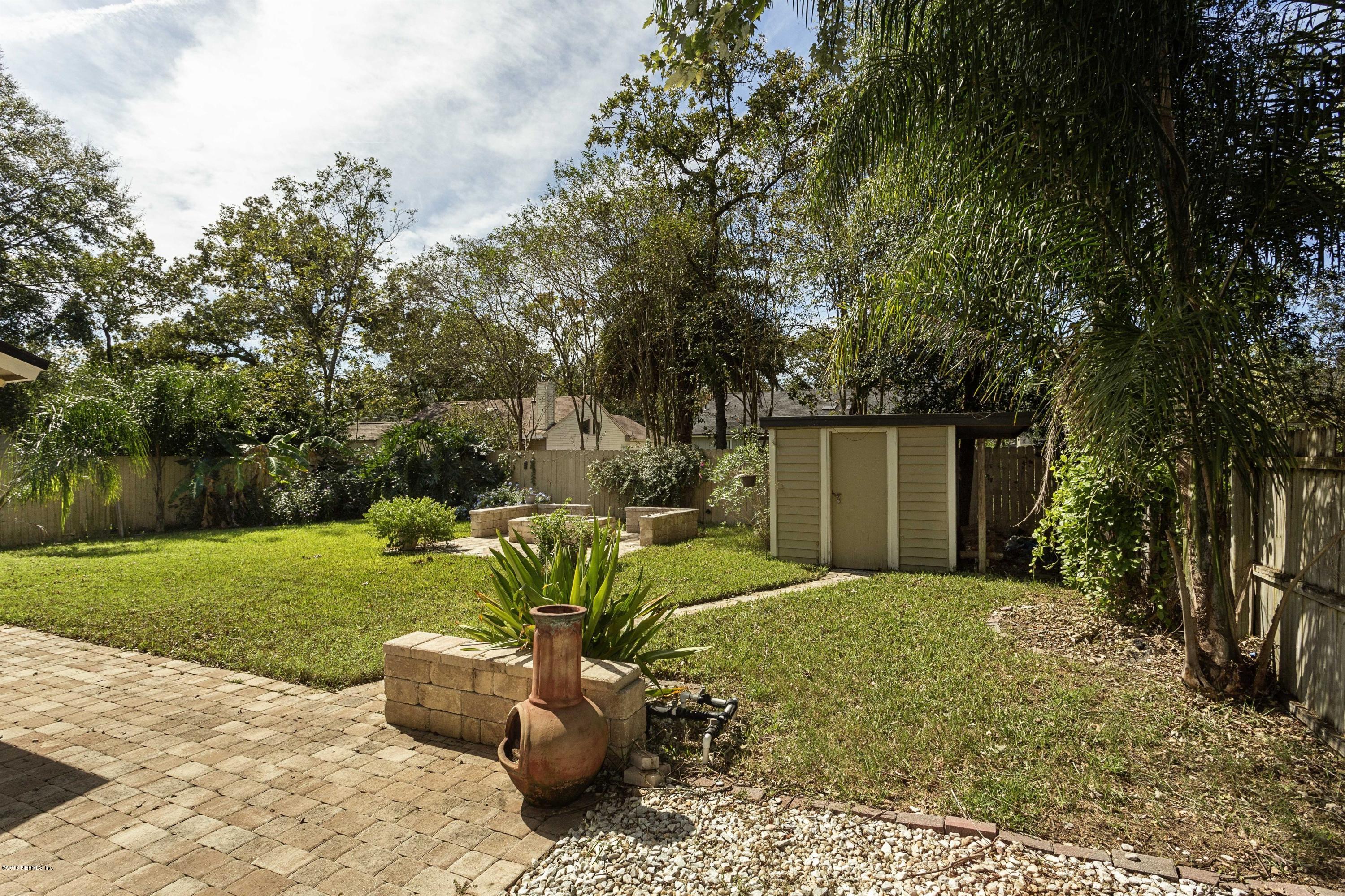 12782 Attrill Road Jacksonville, FL 32258 - Photo 24 of 25 a front view of a house with garden