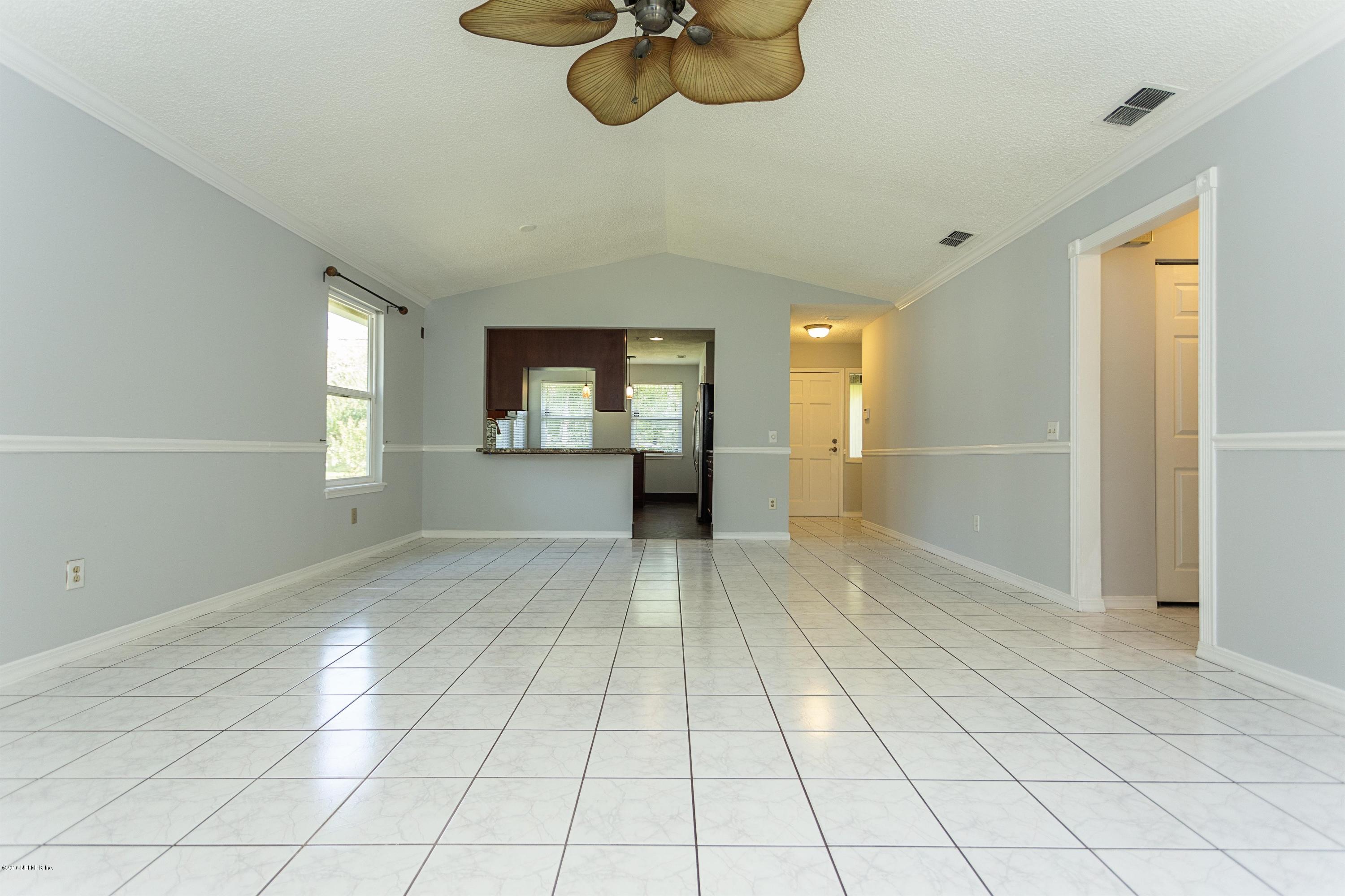 12782 Attrill Road Jacksonville, FL 32258 - Photo 6 of 25 a view of an empty room and window