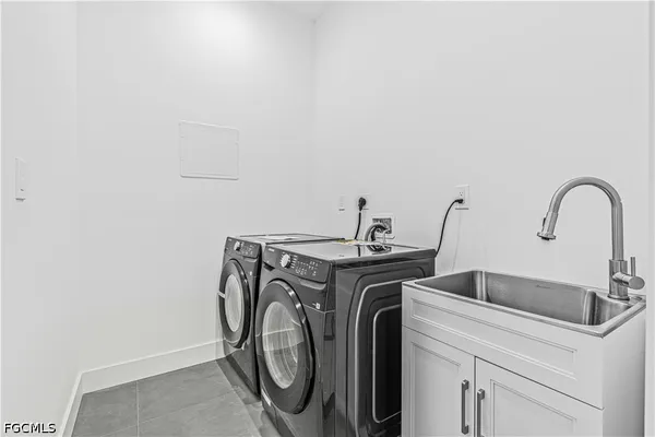 a view of a room with storage and utility room