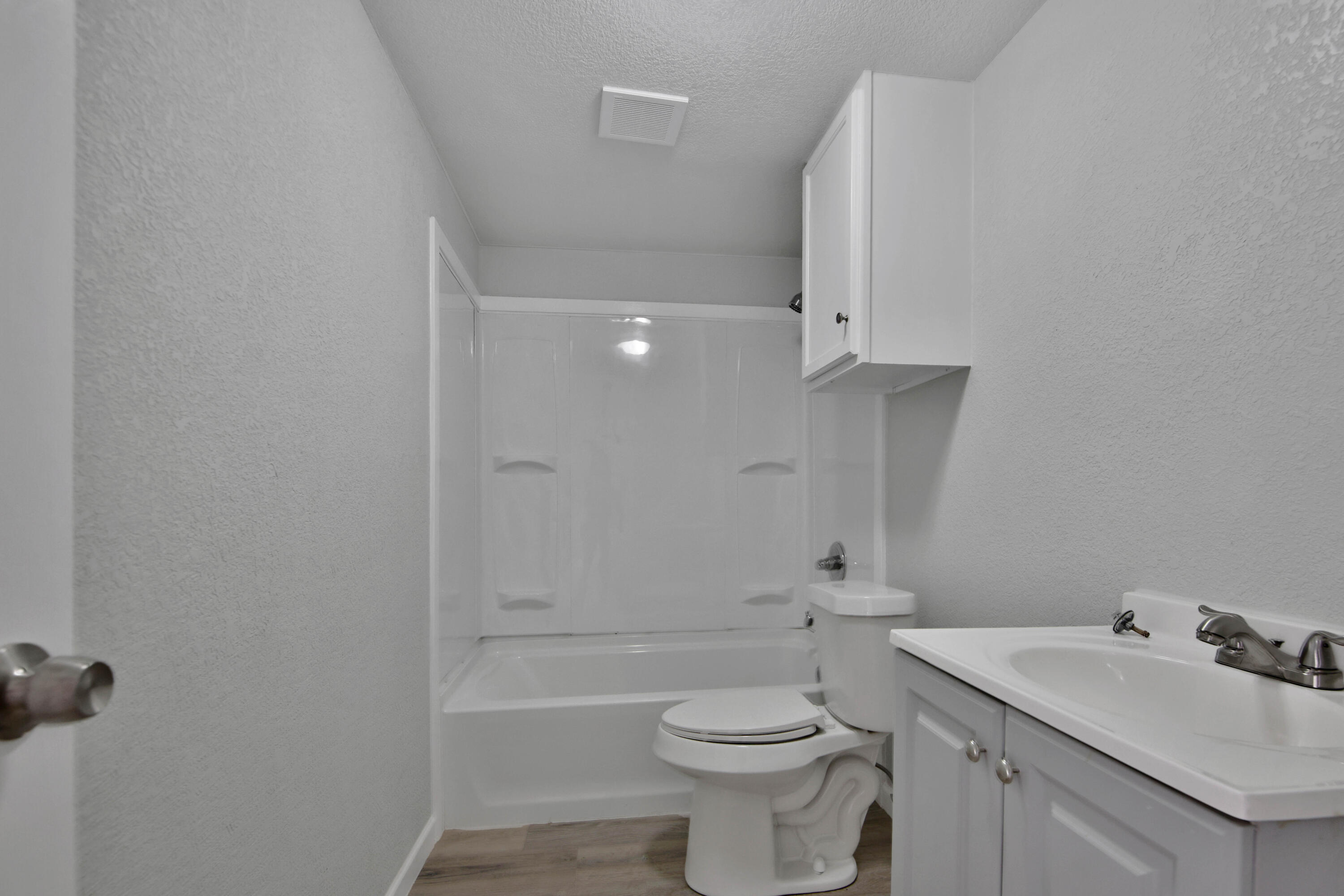312 North Avenue R Lubbock, TX 79415 - Photo 18 of 26 a bathroom with a sink toilet and vanity