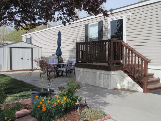 3251 E Road, Unit 99 Clifton, CO 81520 - Photo 6 of 25 a view of a house with patio