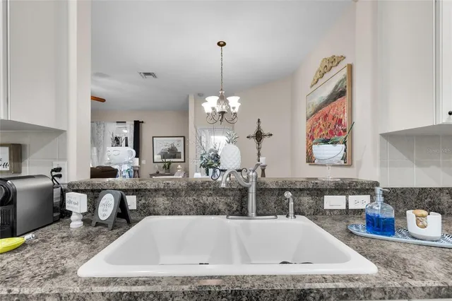 a spacious bathroom with a tub and sink