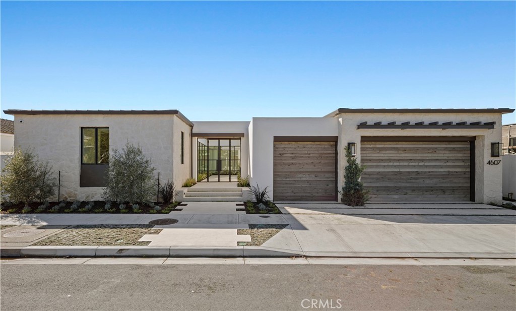 a view of a house with a sitting area