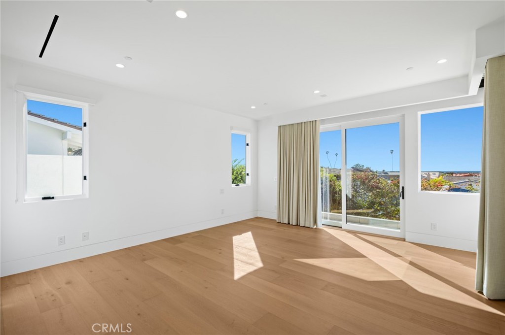 4607 Dorchester Road Corona del Mar, CA 92625 - Photo 15 of 34 a view of an empty room with a window
