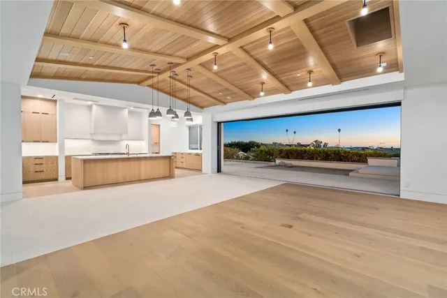 a kitchen with stainless steel appliances a sink and stove