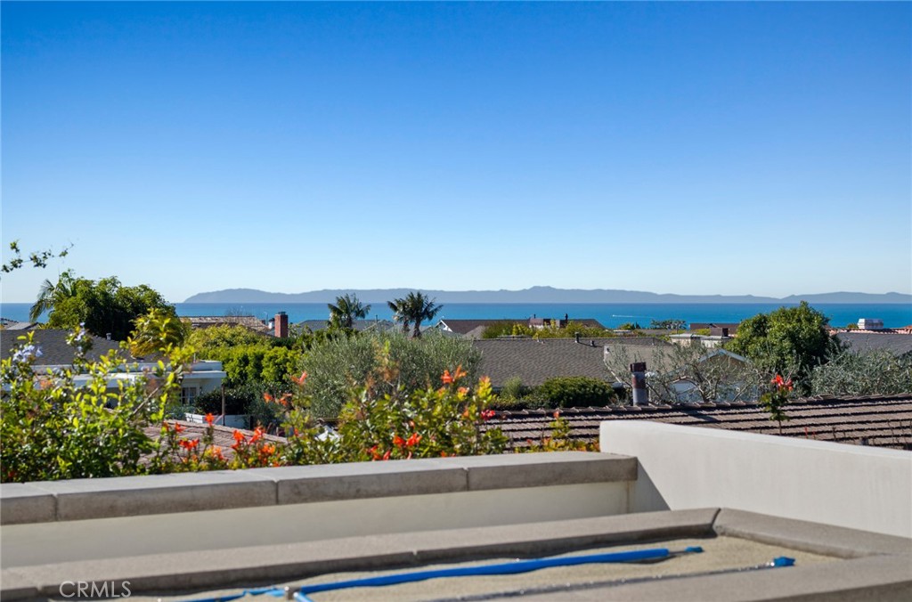 4607 Dorchester Road Corona del Mar, CA 92625 - Photo 7 of 34 a view of swimming pool from a balcony