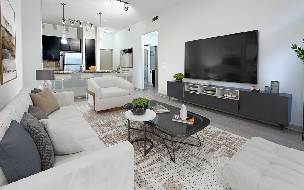 a living room with furniture and a flat screen tv