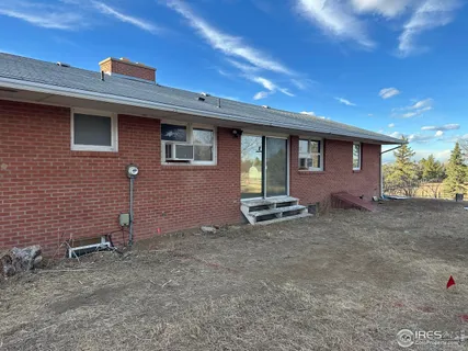 a view of a yard with a bench
