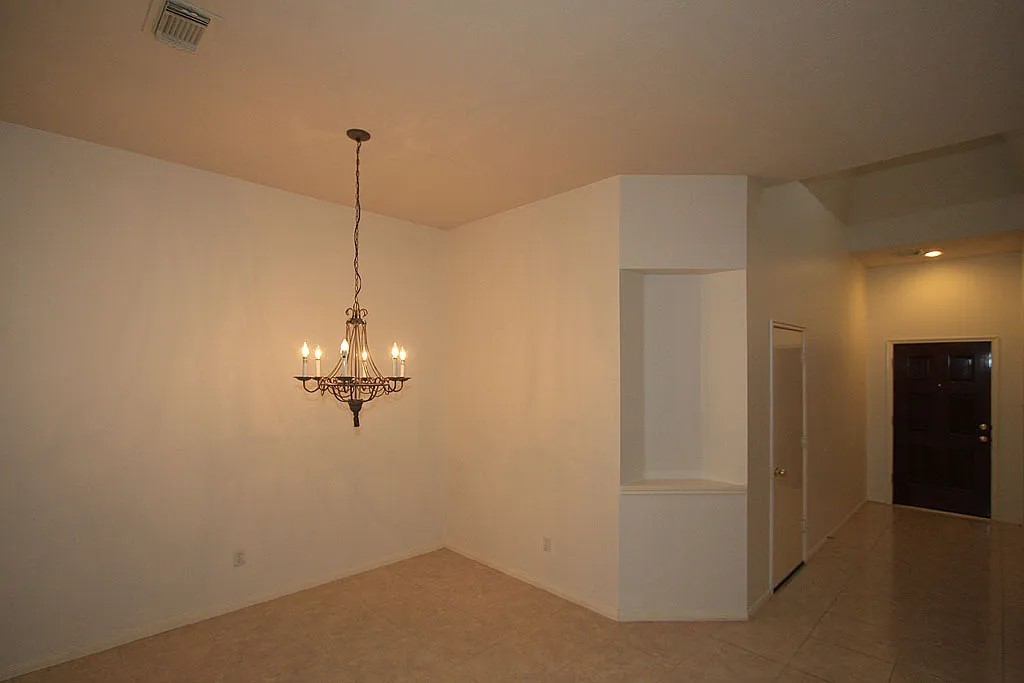 43 Steep Trail Place Conroe, TX 77385 - Photo 3 of 13 a view of a chandelier in a room