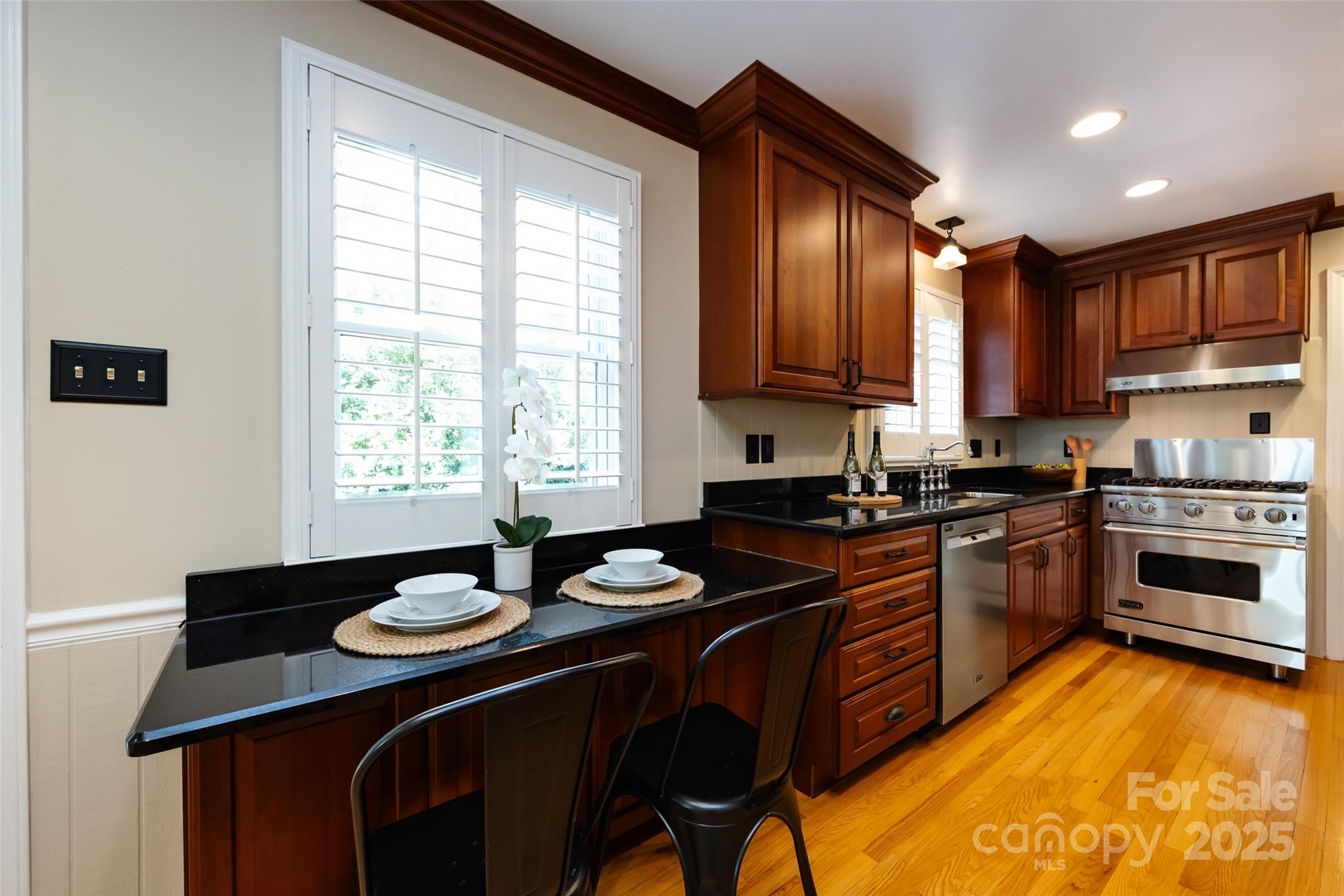 757 Concord Road Davidson, NC 28036 - Photo 16 of 46 a kitchen with a sink stove and microwave