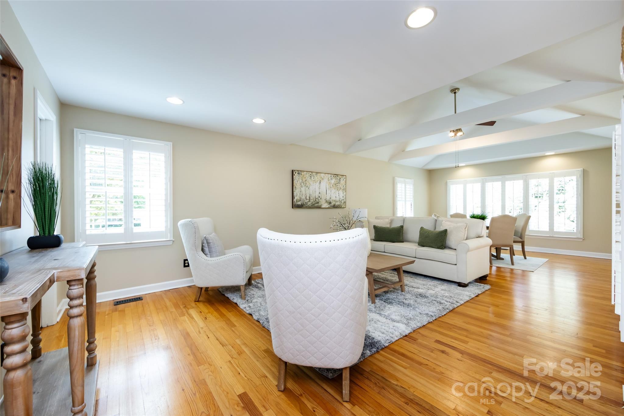 757 Concord Road Davidson, NC 28036 - Photo 17 of 46 a living room with furniture and a wooden floor