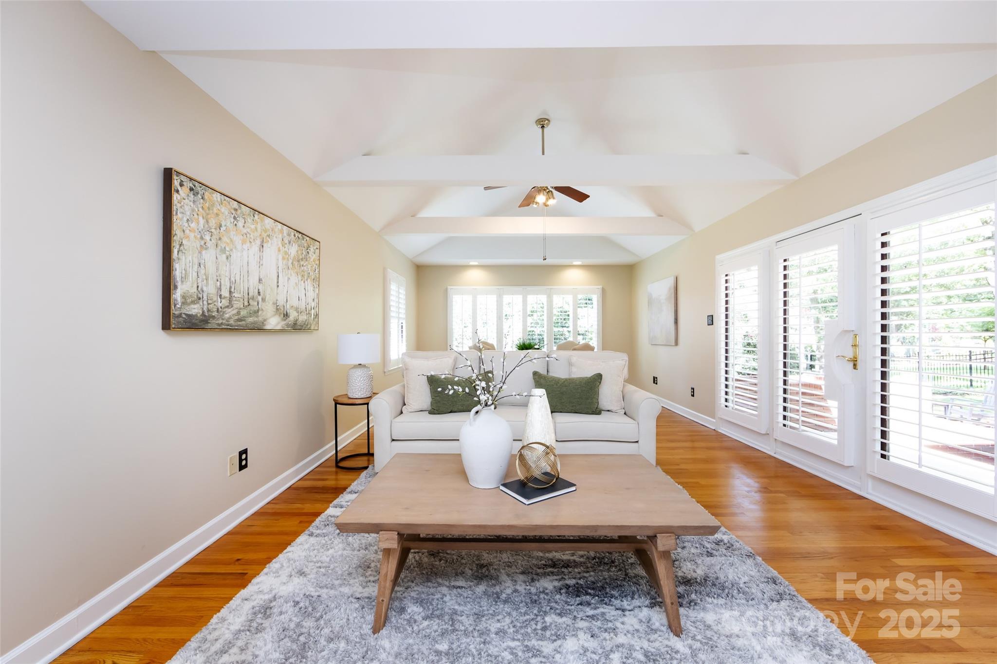 757 Concord Road Davidson, NC 28036 - Photo 18 of 46 a living room with furniture and a large window
