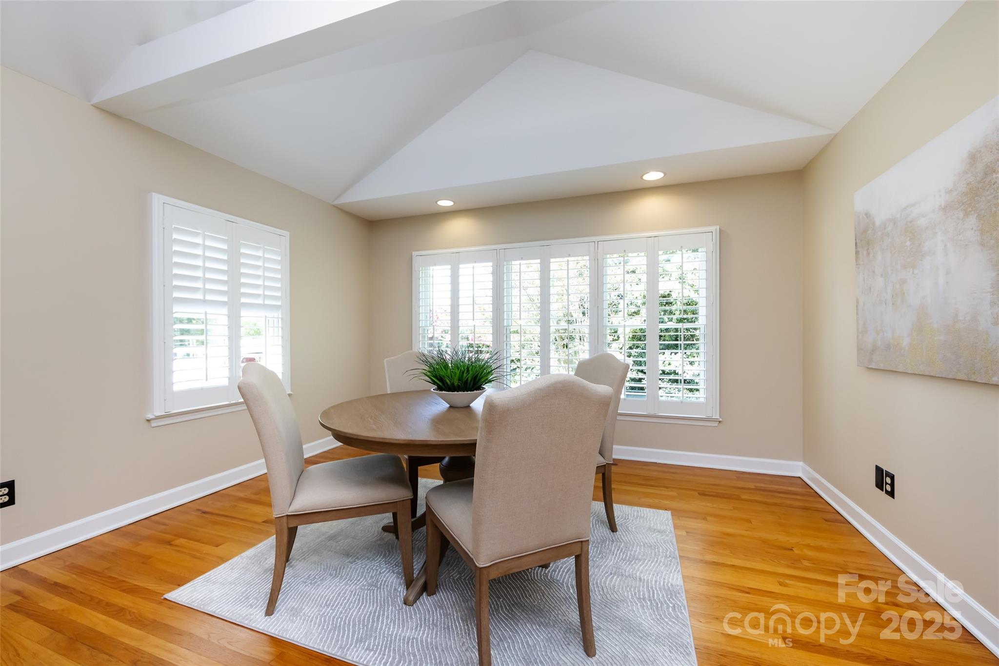 757 Concord Road Davidson, NC 28036 - Photo 21 of 46 a dining room with furniture and wooden floor