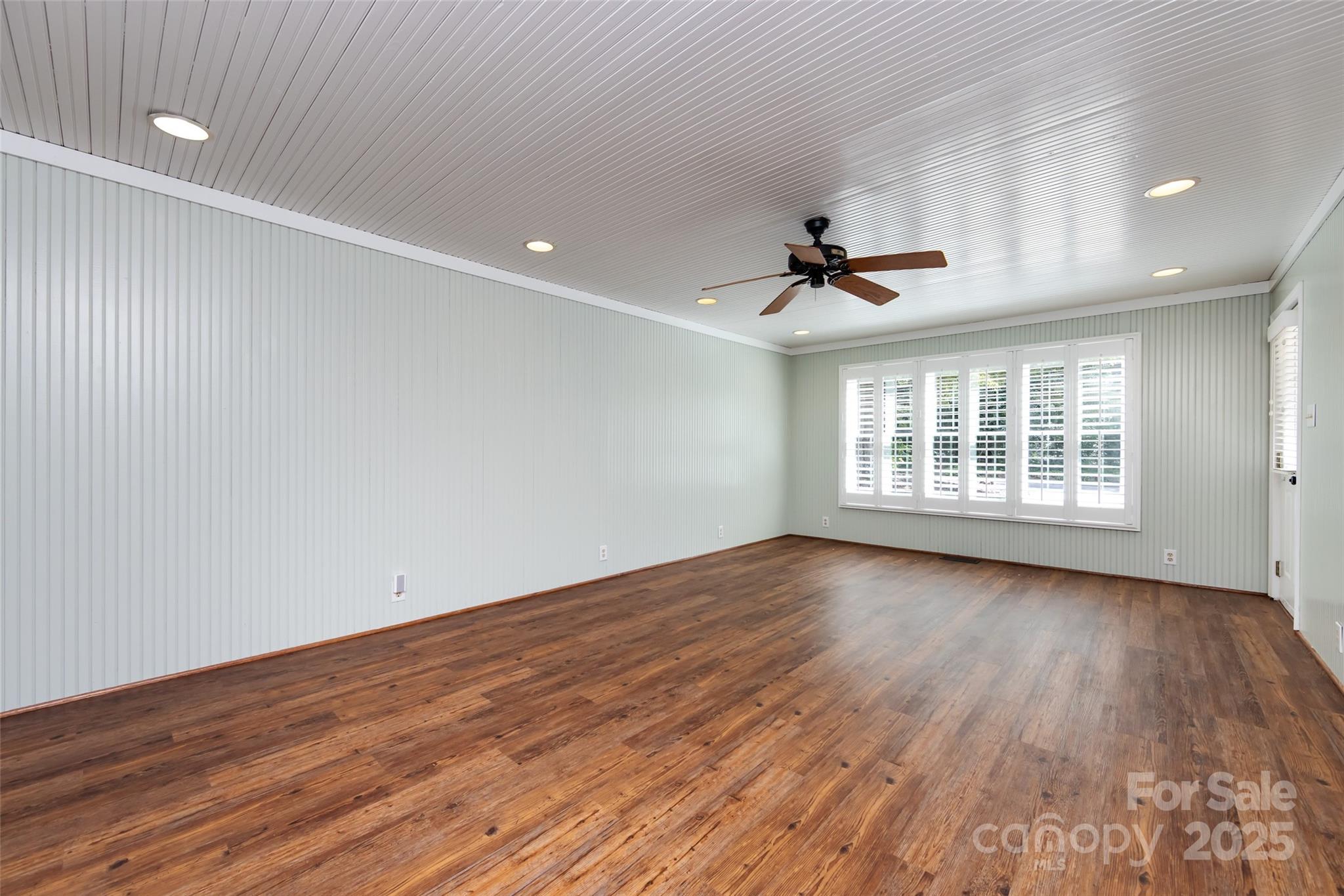 757 Concord Road Davidson, NC 28036 - Photo 24 of 46 wooden floor in an empty room with a window