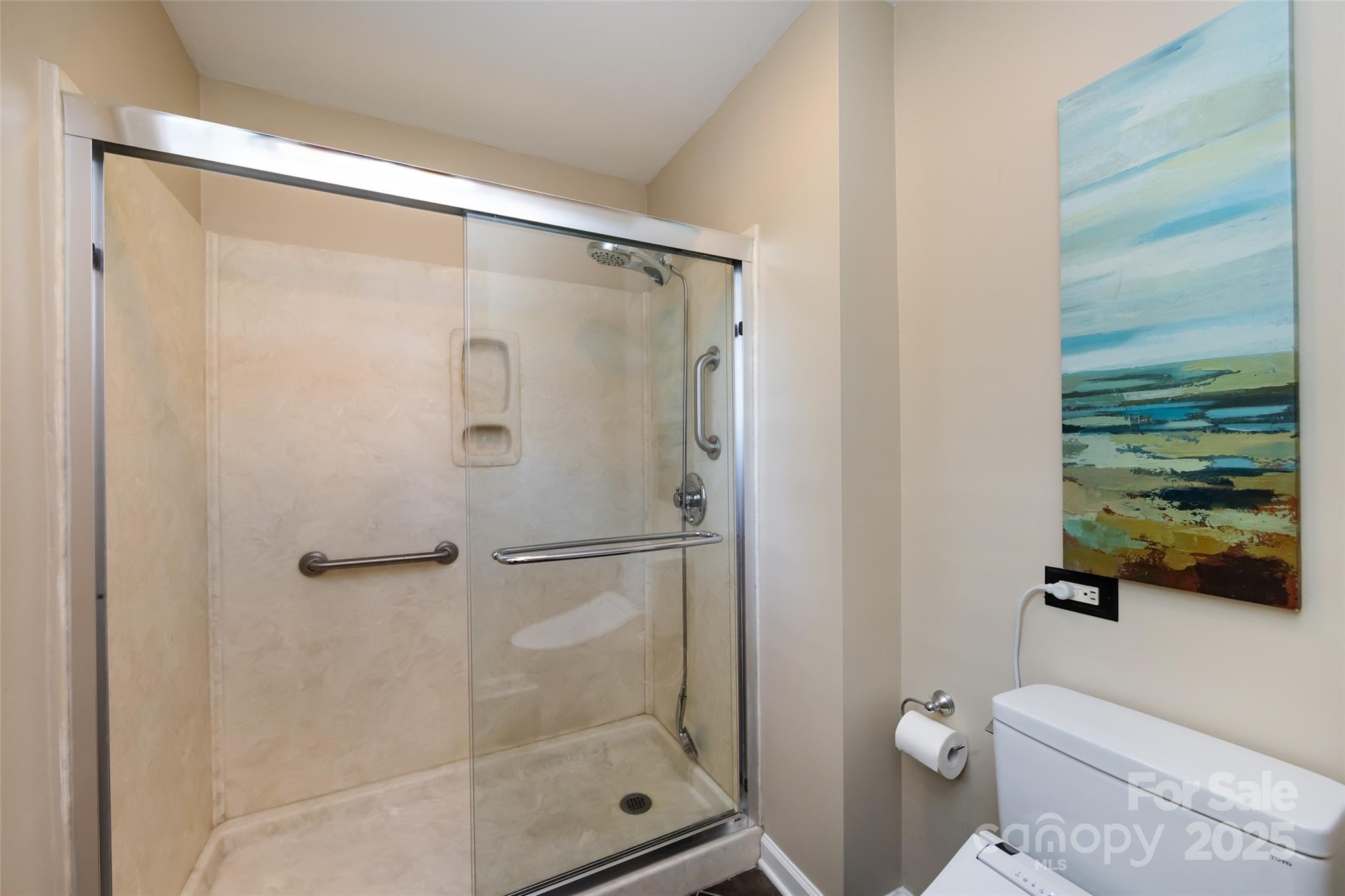 757 Concord Road Davidson, NC 28036 - Photo 30 of 46 a bathroom with a shower and a toilet