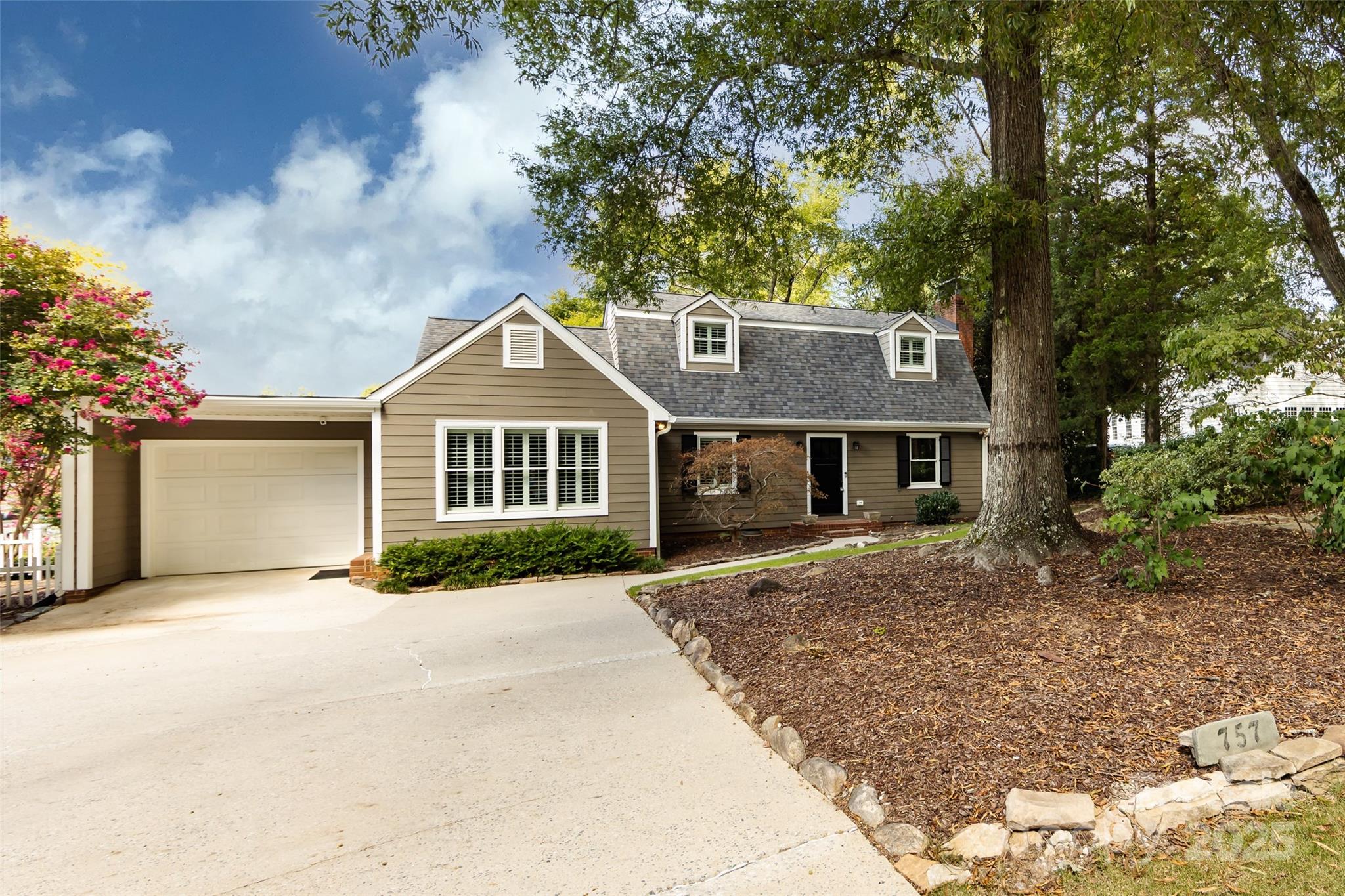 757 Concord Road Davidson, NC 28036 - Photo 3 of 46 a front view of a house with a yard