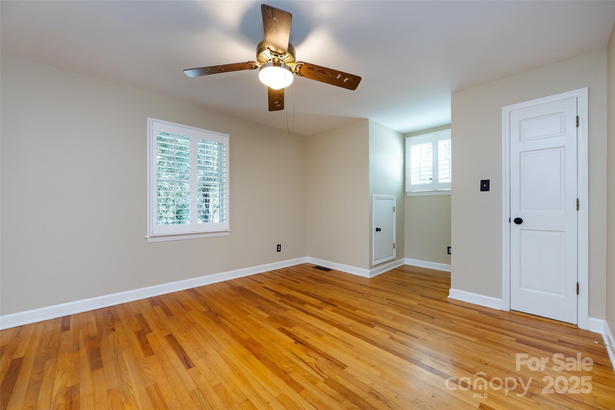 757 Concord Road Davidson, NC 28036 - Photo 32 of 46 wooden floor in an empty room with a window