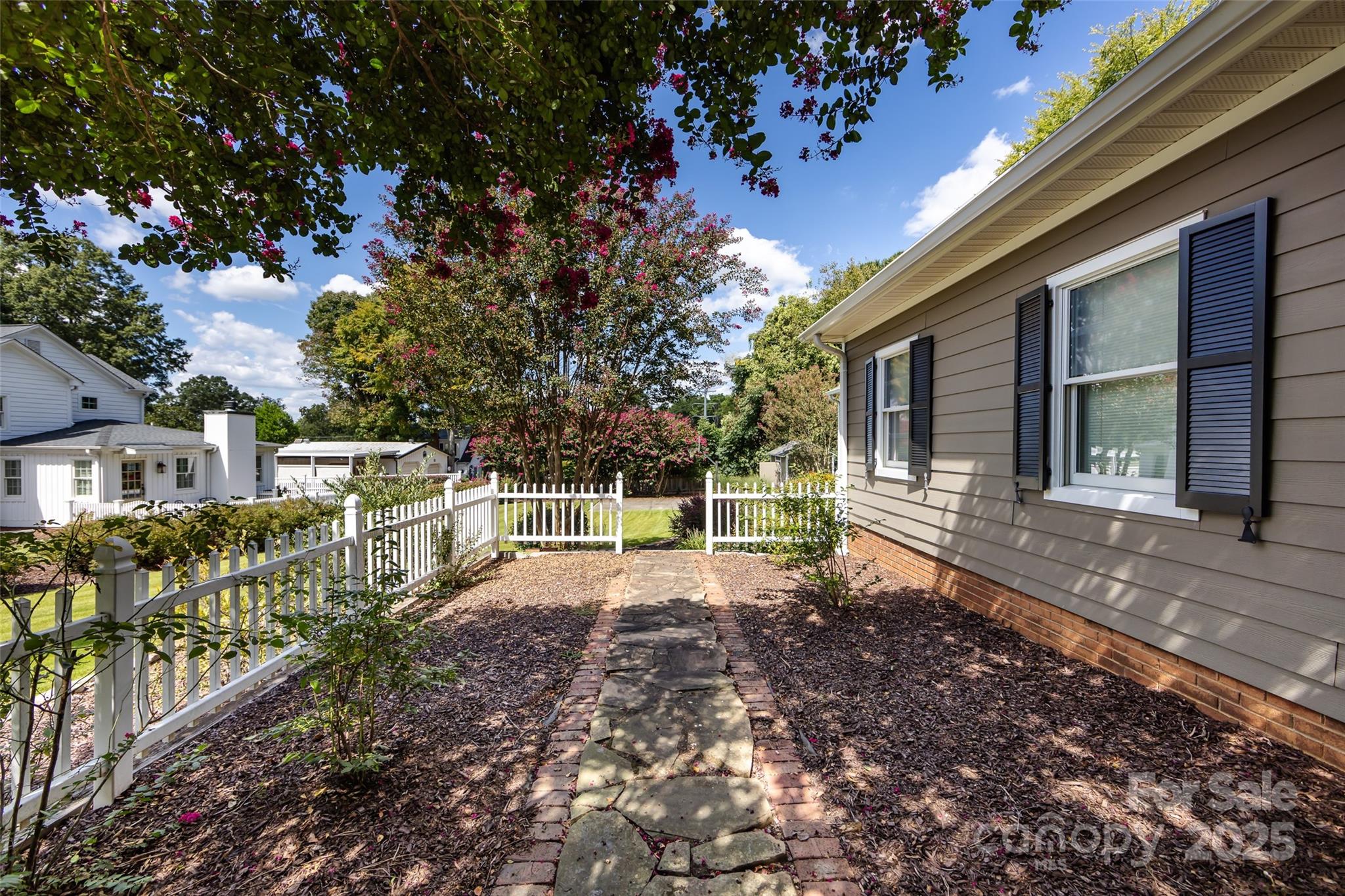 757 Concord Road Davidson, NC 28036 - Photo 36 of 46 a view of a house with backyard and sitting area