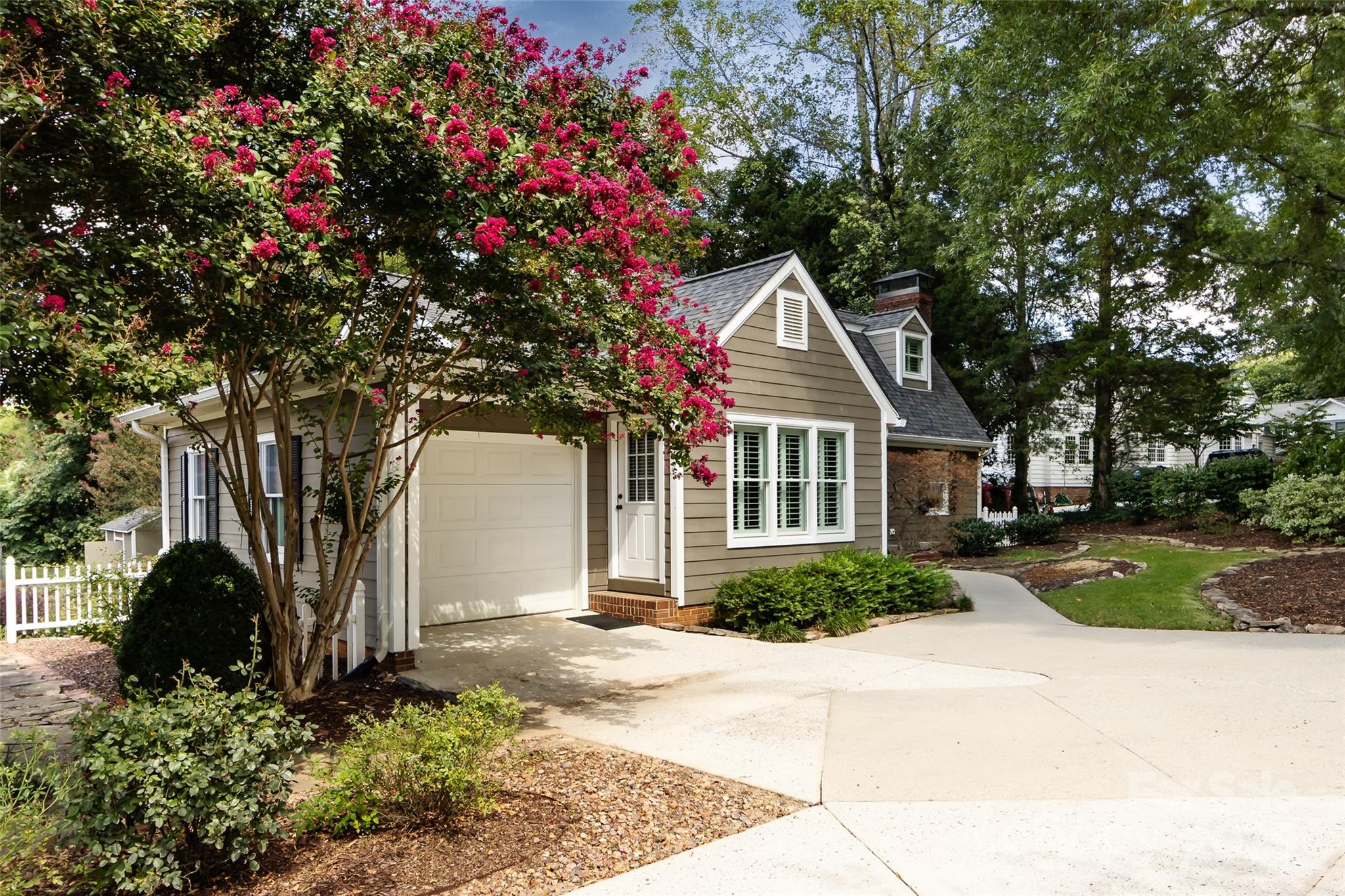 757 Concord Road Davidson, NC 28036 - Photo 43 of 46 a front view of a house with a yard and trees