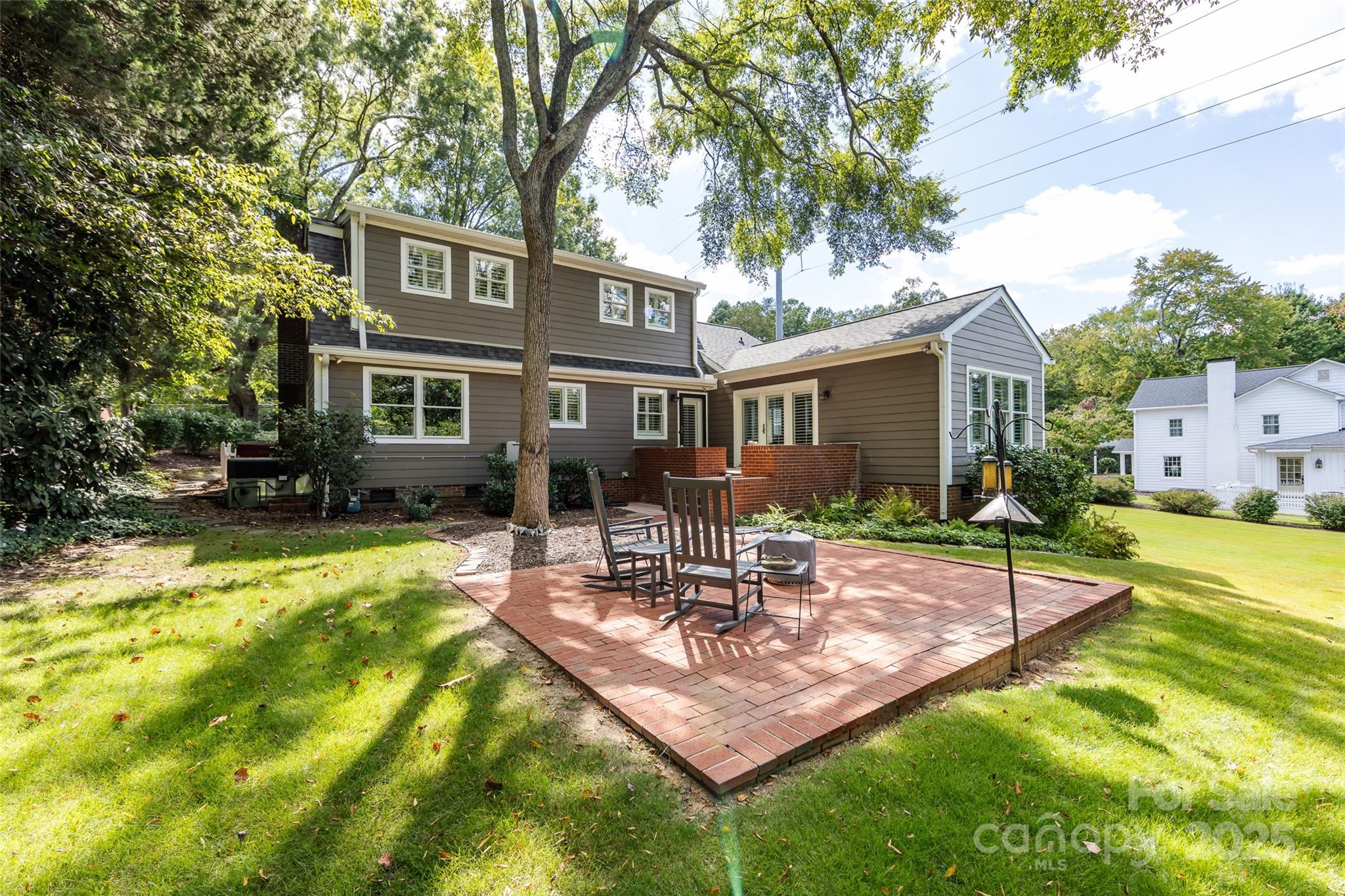 757 Concord Road Davidson, NC 28036 - Photo 44 of 46 a view of a house with swimming pool and sitting area
