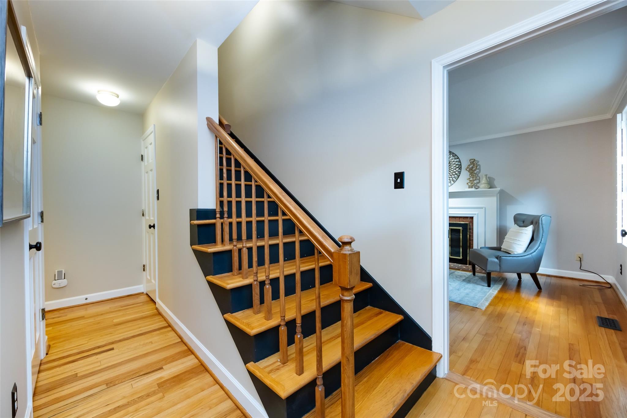 757 Concord Road Davidson, NC 28036 - Photo 6 of 46 a view of entryway livingroom and hall with wooden floor
