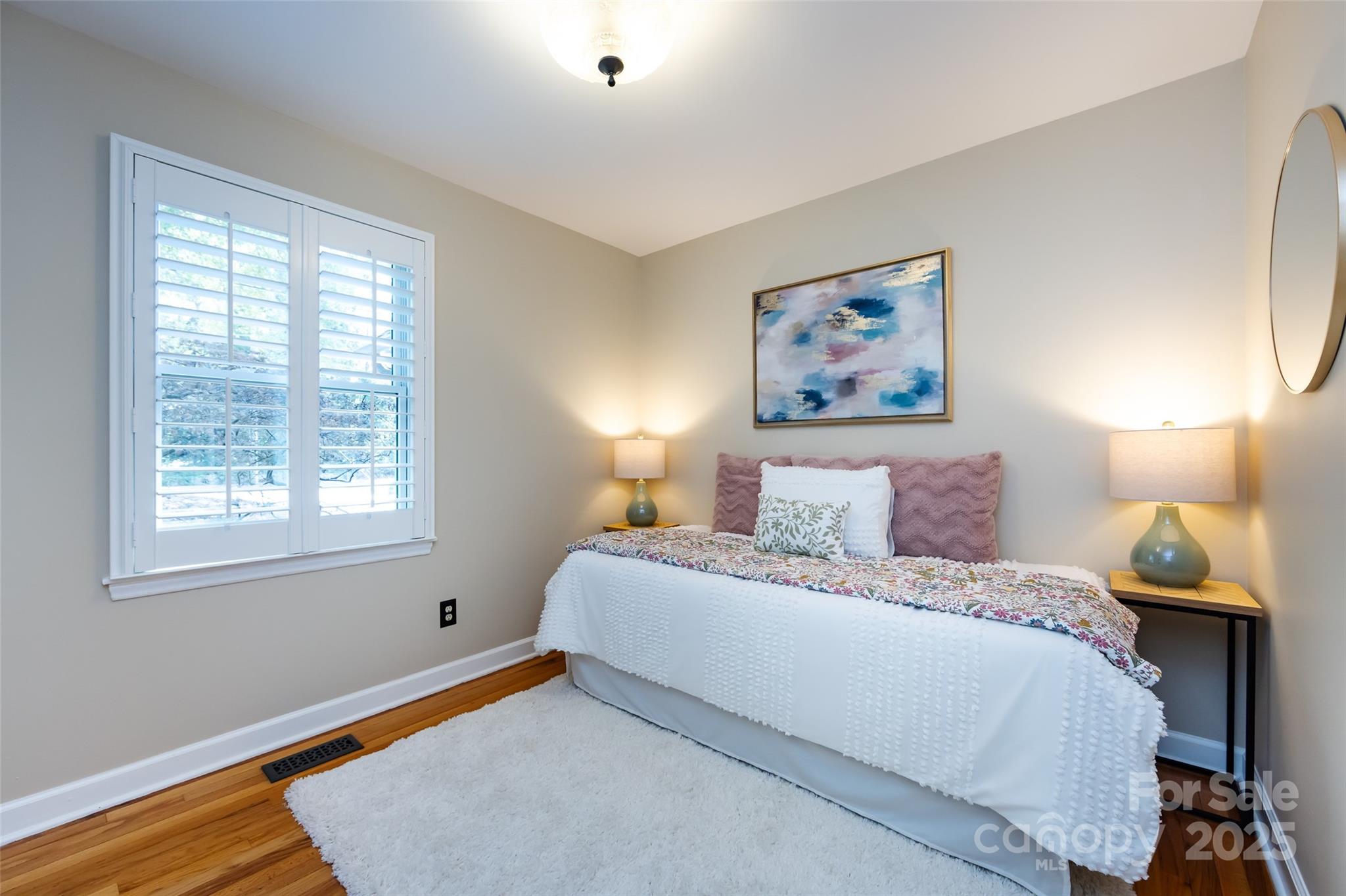 757 Concord Road Davidson, NC 28036 - Photo 8 of 46 a bedroom with a bed and a window