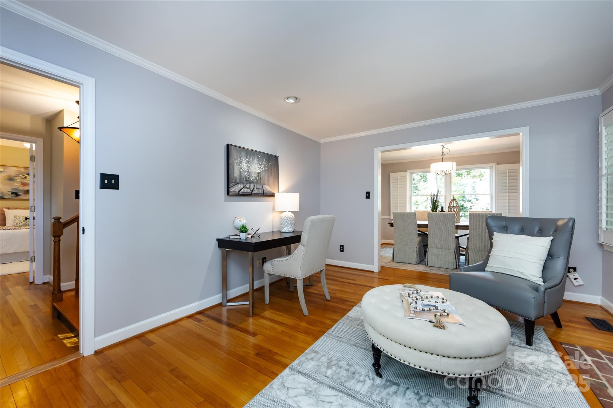 757 Concord Road Davidson, NC 28036 - Photo 9 of 46 a living room with furniture a table and a large window