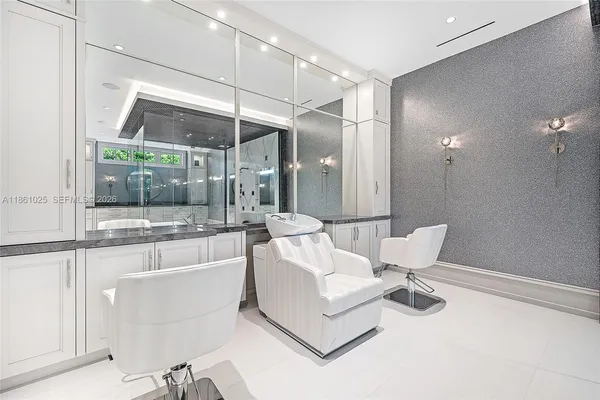 a spacious bedroom with a large bed and a large window