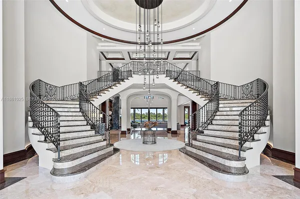 a living room with lots of furniture and window