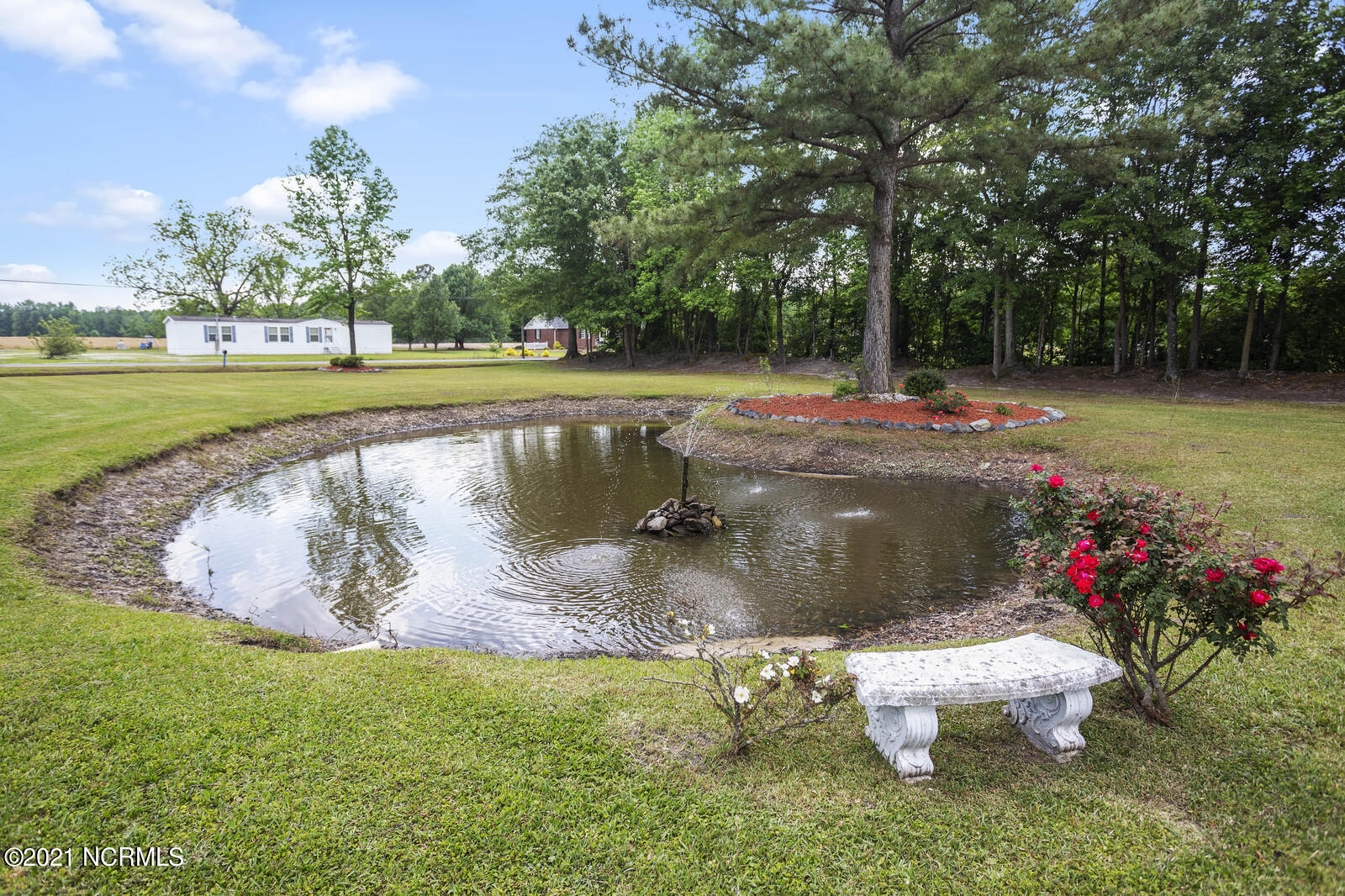 421 Jackson Store Road Beulaville, NC 28518 - Photo 4 of 99 Pond with Fountain