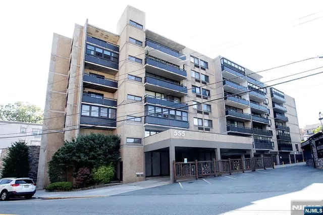 a front view of a building with street