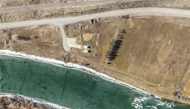 a view of an ocean with mountain view