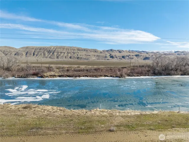 a view of a lake with mountains in the background