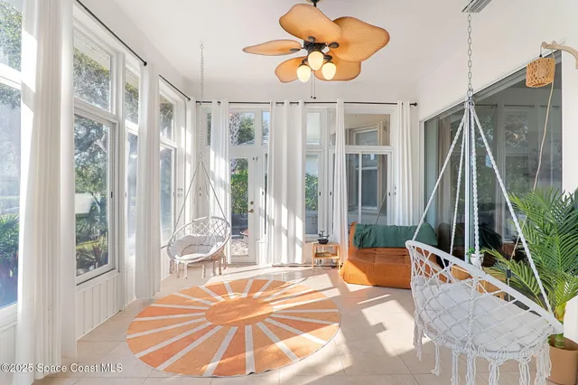 a view of a livingroom with furniture and front door