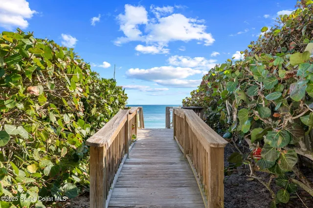 a view of balcony and yard