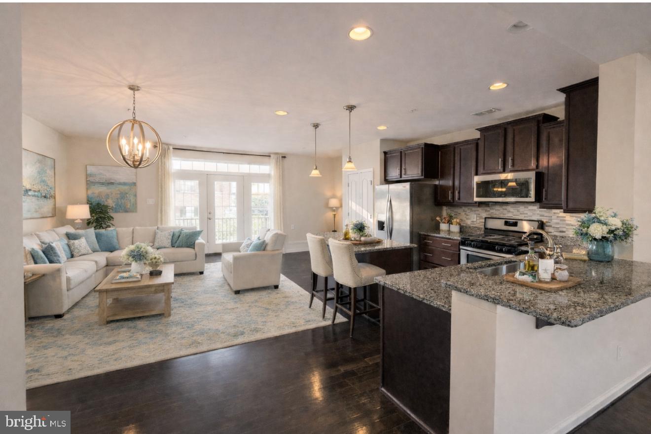 AI Staged .Kitchen and family room