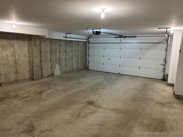 17 Vermont Avenue, Unit 17 Fairfield, CT 06824 - Photo 15 of 16 a view of a garage