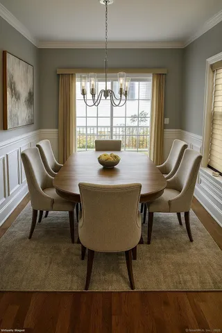 a view of a dining room with furniture window and outside view