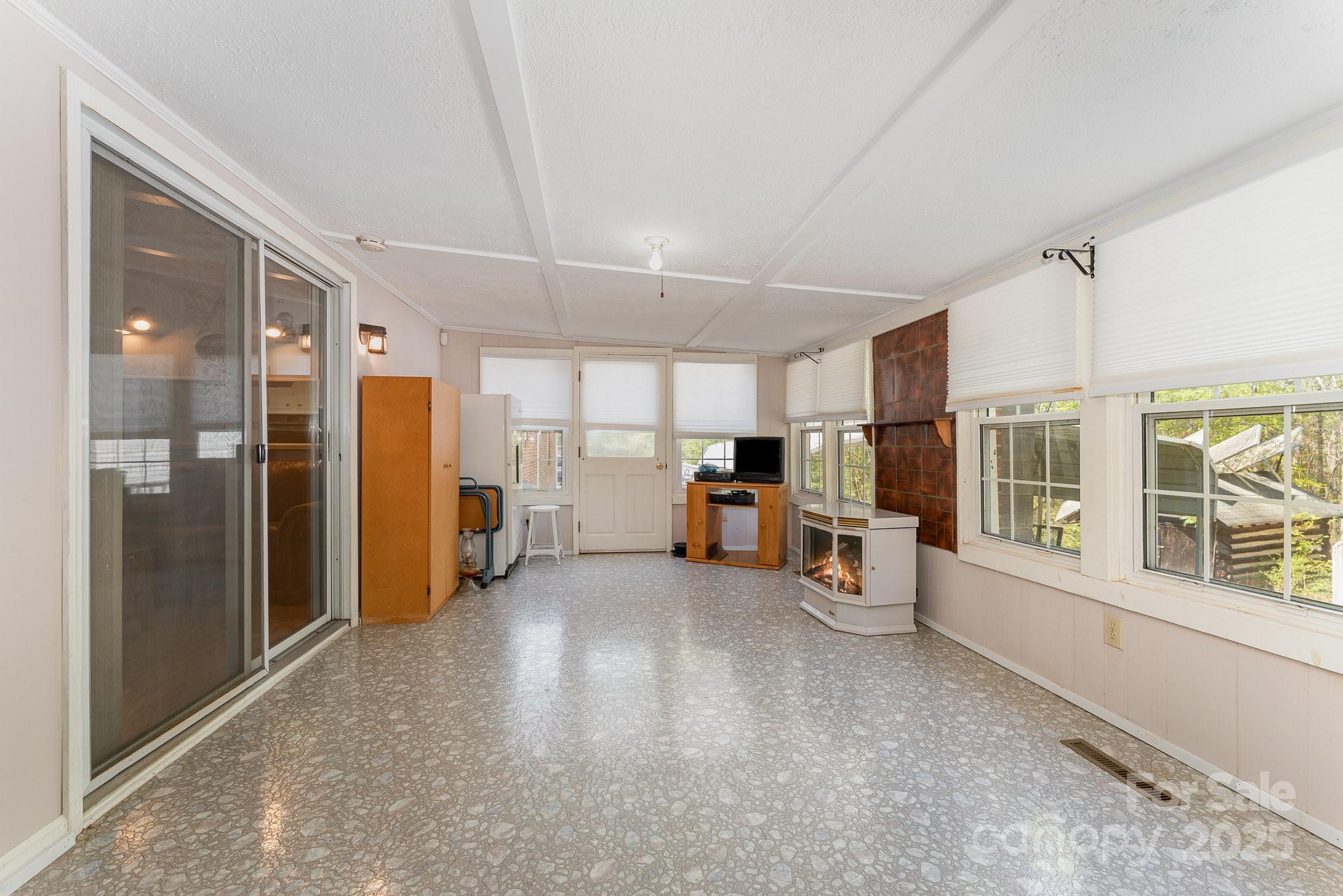 5013 Friendship Circle Road East Bend, NC 27018 - Photo 21 of 31 a view of a living room hardwood and windows