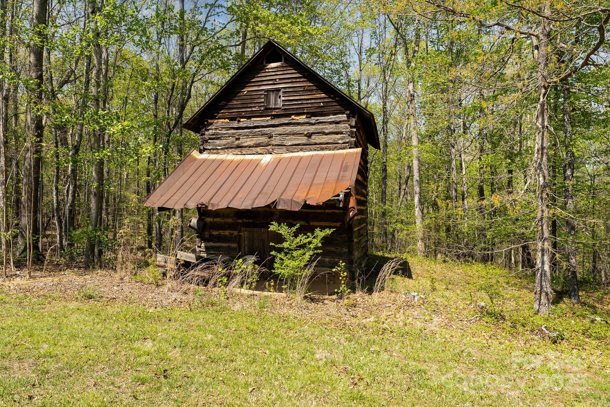 5013 Friendship Circle Road East Bend, NC 27018 - Photo 30 of 31 a view of a backyard with table and chairs