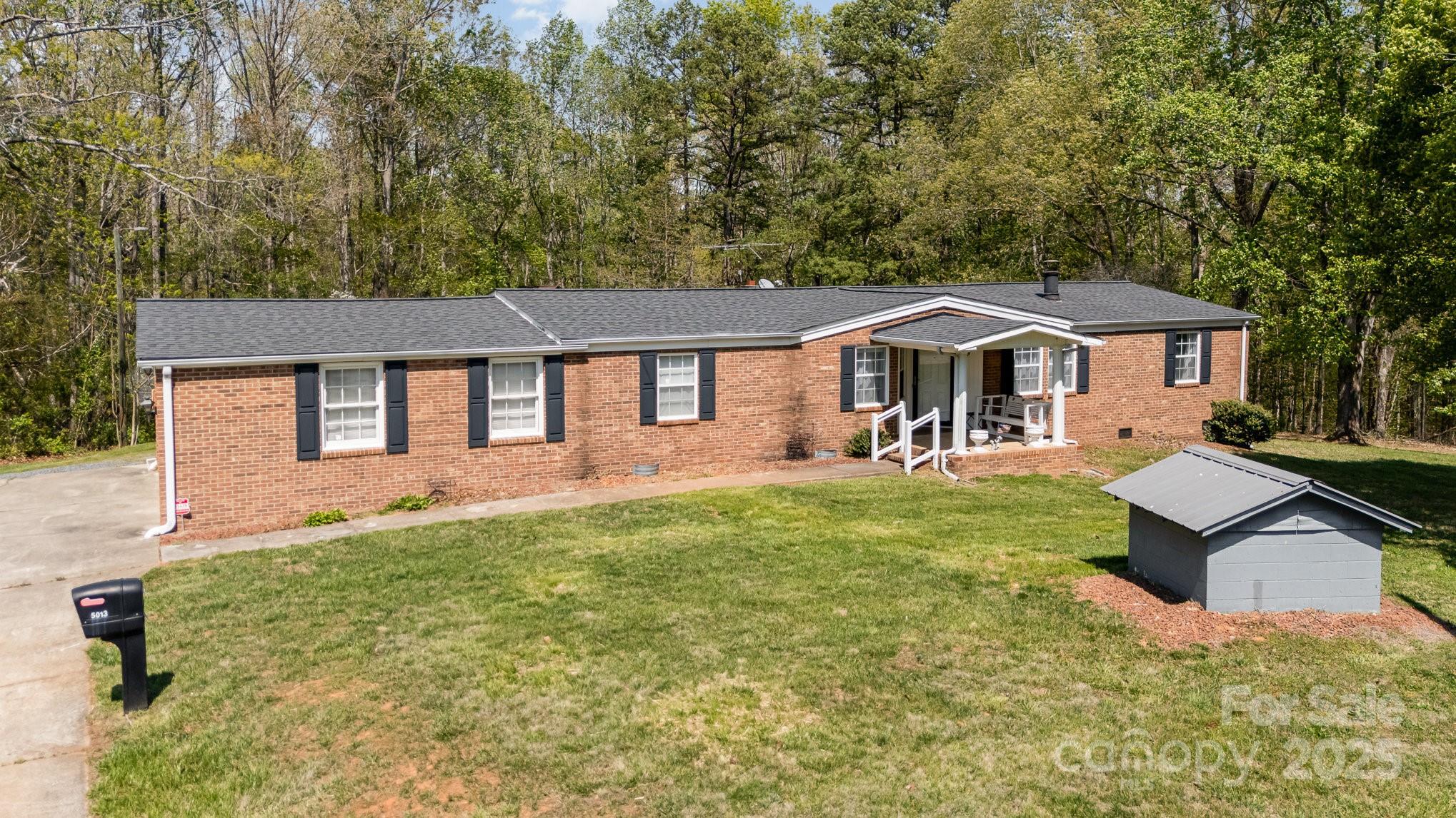 5013 Friendship Circle Road East Bend, NC 27018 - Photo 6 of 31 a front view of a house with a yard