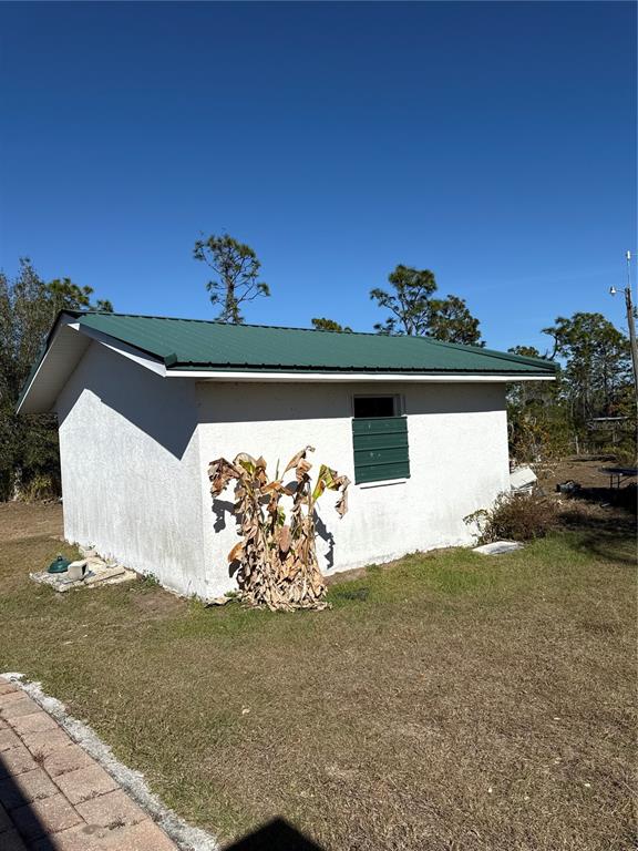 29310 Bryan Way Punta Gorda, FL 33982 - Photo 25 of 30 a view of a back yard