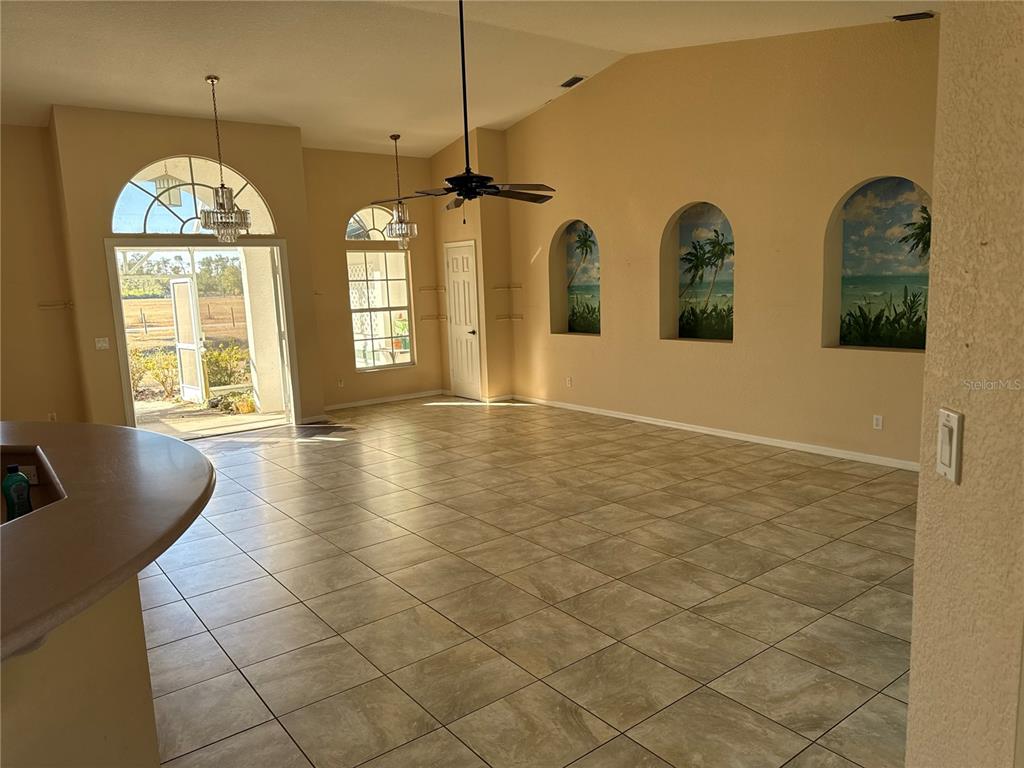 29310 Bryan Way Punta Gorda, FL 33982 - Photo 5 of 30 a view of an empty room with windows