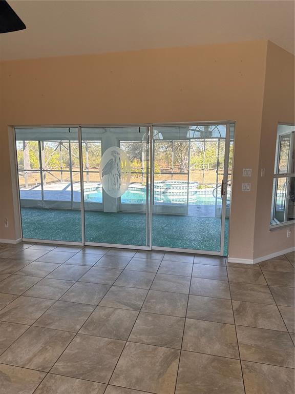 29310 Bryan Way Punta Gorda, FL 33982 - Photo 7 of 30 a view of an empty room and window