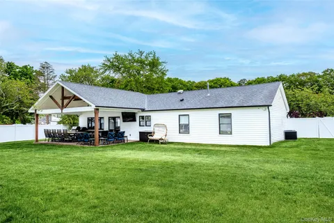 a house view with a garden space