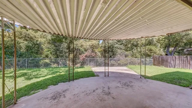 a view of a park with a slide